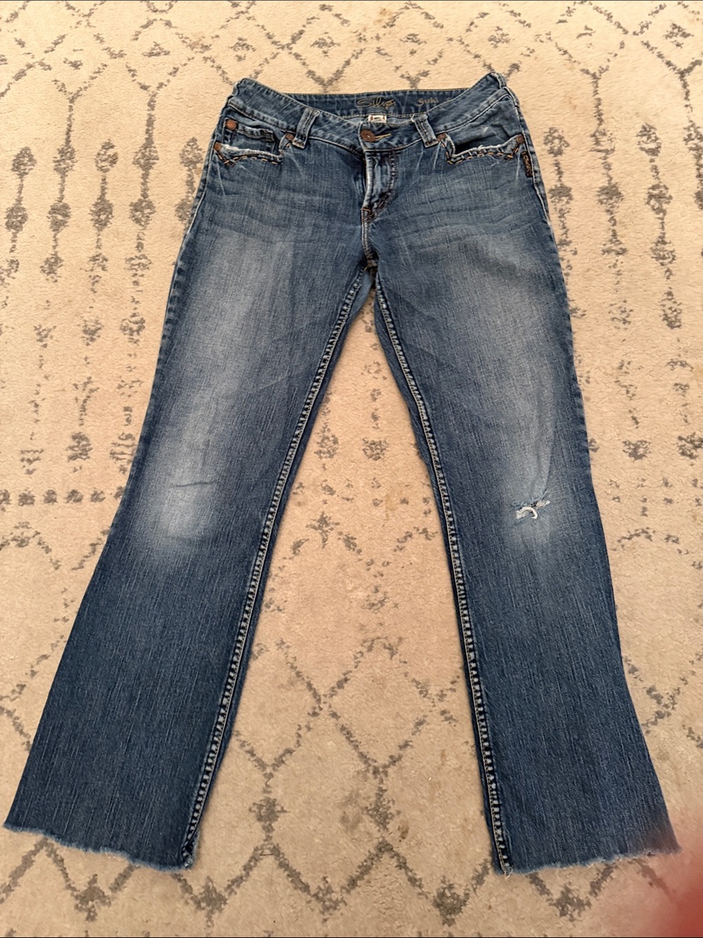 Silver Jeans Distressed Flare in Medium Blue